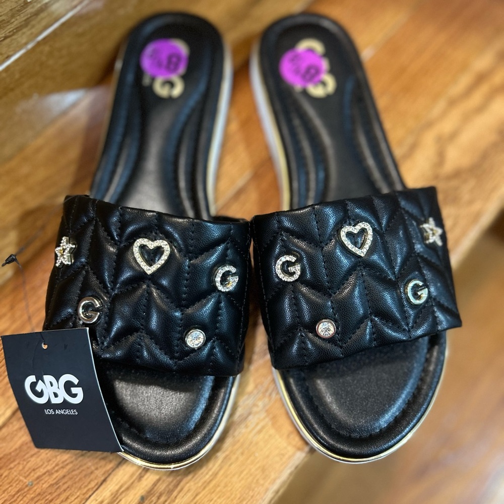 GBG Los Angeles Black Quilted Slides with Gold Accents.